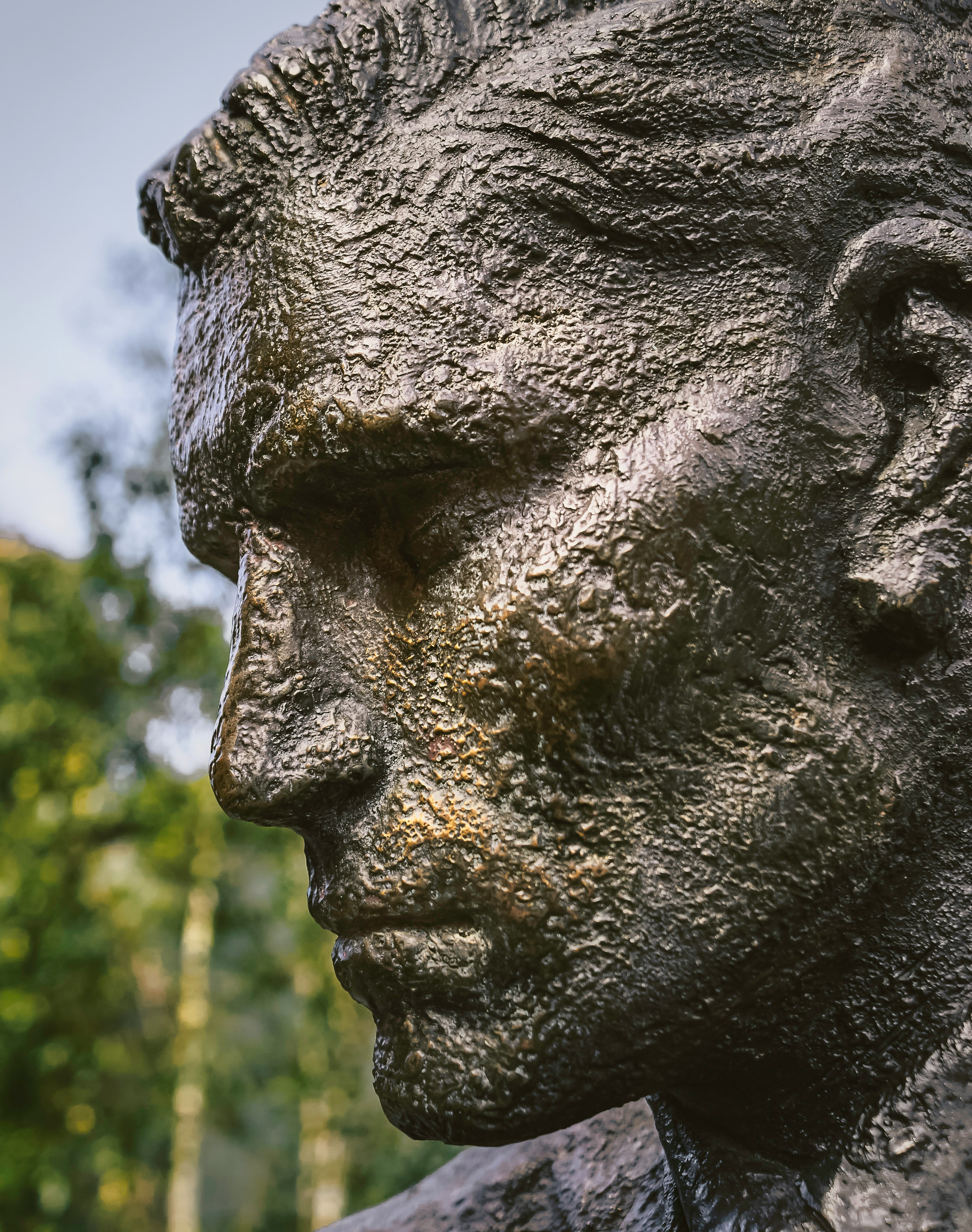 grey concrete statue during daytime